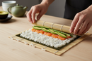 how to make sushi with a rolling mat 